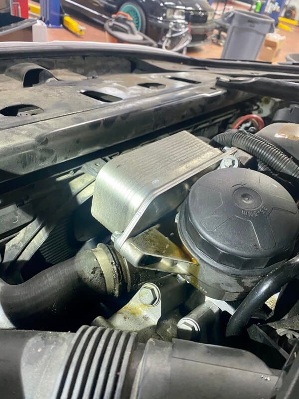 Repairing a BMW Oil Filter Housing Gasket Leak with EurAuto Shop in Plano Tx, an image of the oil gasket housing in a vehicle that was brought in to shop