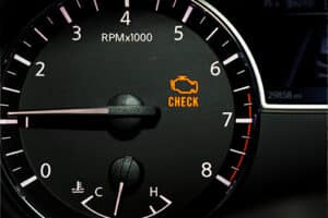 BMW check engine light illuminated on dashboard.