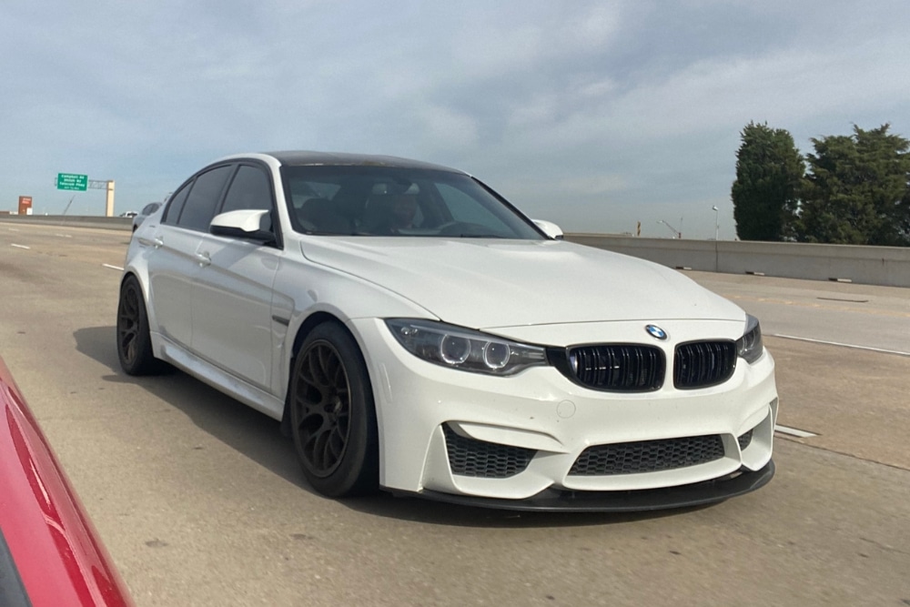 BMW M-Series Performance Upgrades in Plano TX At EurAuto Shop. Close up view of White BMW M-series. vehicle