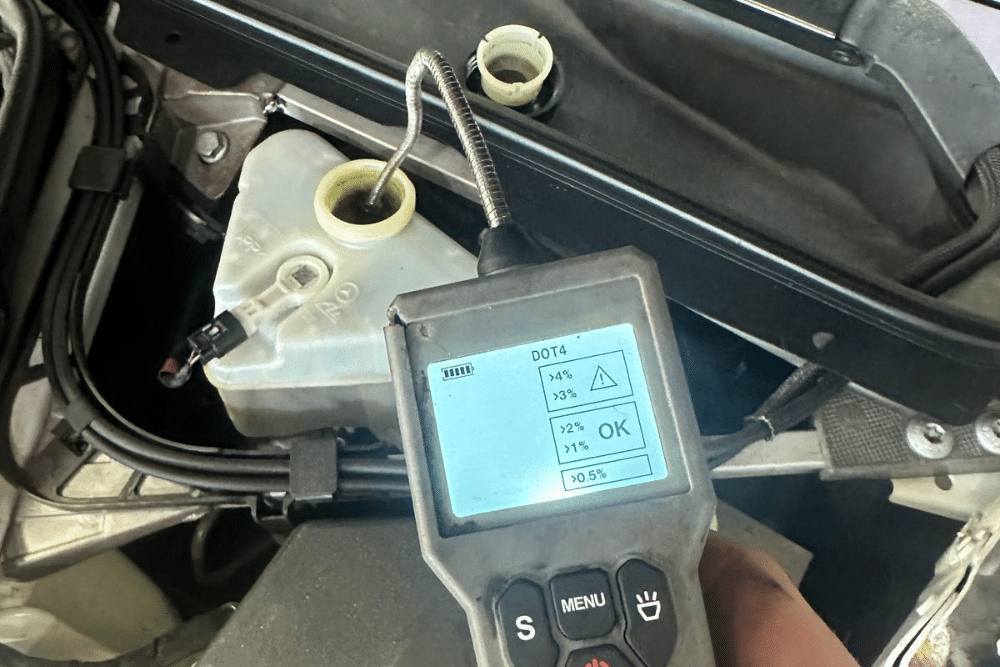 Spring Fluid Check, Fluid Check in Plano TX At EurAuto Shop. Image of spring brake fluid check on a European car